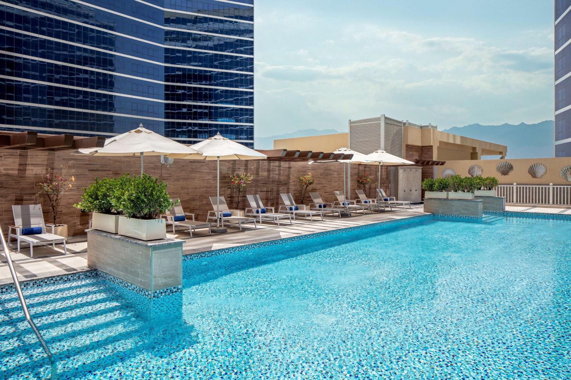 Doubletree By Hilton Fujairah City Exterior photo The swimming pool at the hotel